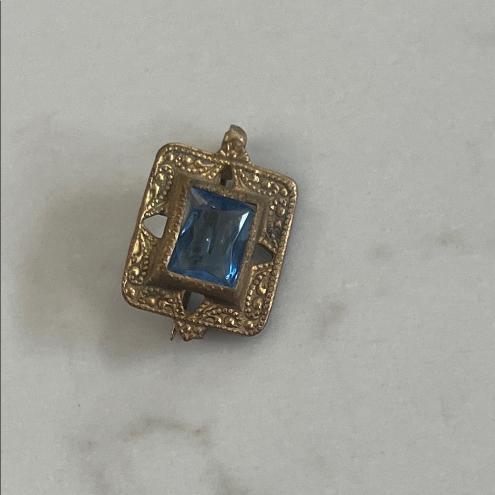 Elegant Gold and Blue Brooch